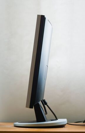 Side view of a flat computer monitor.