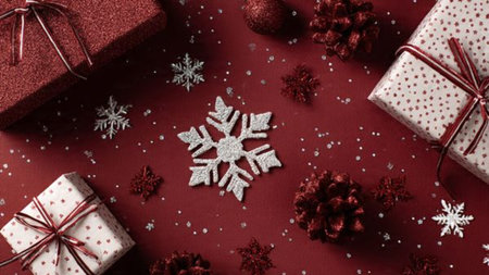 Contemporary holiday minimalism using refined red-and-gold tones and balanced spacing.の写真素材