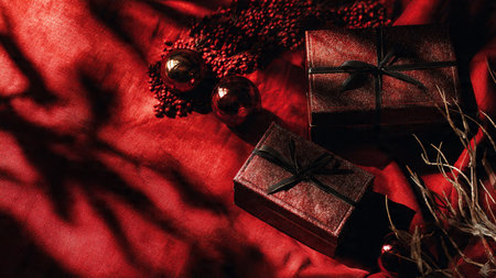 Radiant gold stars and red ornaments creating a warm traditional Christmas frame.