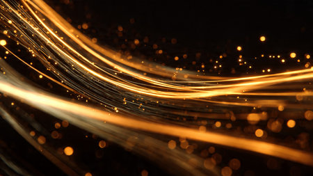 Smooth metallic gold lines crossing deep black space.の写真素材