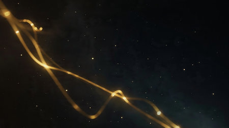 Dramatic lighting effect over sleek black and gold surface.
