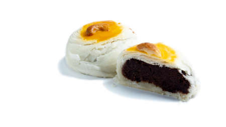 Chinese red beans pastry topping with cashew nut sliced on the white background.の写真素材