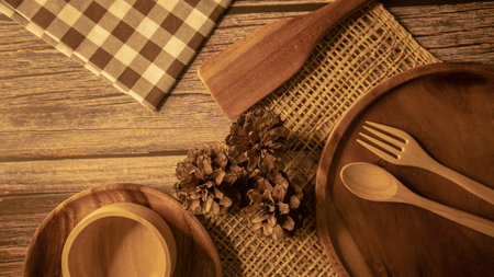 Decorative wooden table flatview with kitchenware,warm mood&tone.の写真素材