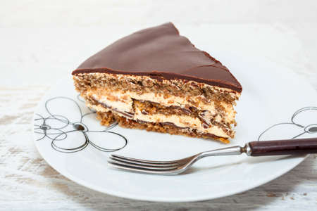 Vanilla, nut and chocolate cake
