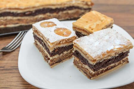 Apple, walnut, and poppy seed cakeの写真素材