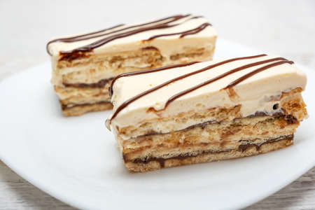 Slice of delicious vanilla and chocolate cake