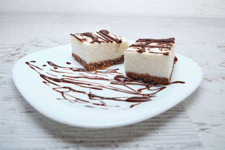 Coconut cake with chocolate on topの写真素材