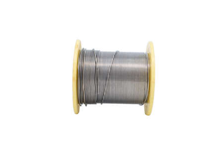 Roll of solder (lead wire) isolated on the white backgroundの写真素材