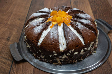 Orange cake with chocolate and orange slices. Kilimanjaro cake