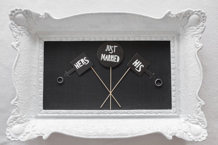 Just married - decoration on table with ringsの写真素材