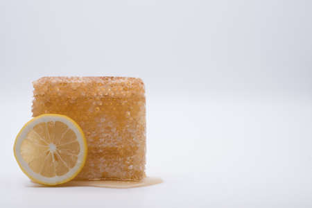 Honey and lemon on white backgroundの写真素材