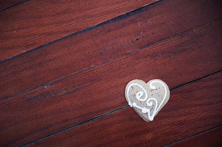 Heart-shaped cookies on a wooden background. Love conceptの写真素材