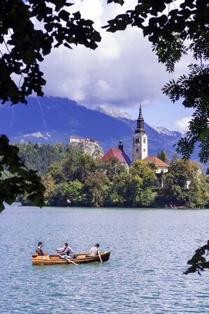 LAKE BLED, SLOVENIA - AUGUST 2010: Recreation Tourist Boad at Lake Bled in Slovenia, Europe on August 29, 2010.のeditorial素材