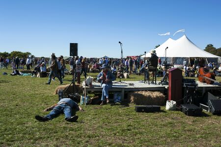 NANTUCKET ISLAND, MASSACHUSETTS - OCTOBER 5: Visitors at Nantucket Cranberry Festival, famous...