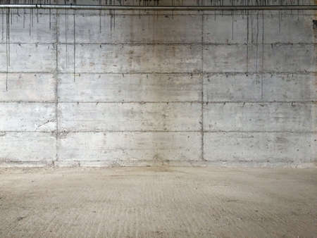Exposed New Grungy Grey Concrete Wallの写真素材