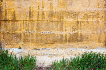 Industrial background, empty grunge urban street with warehouse brick wallの写真素材