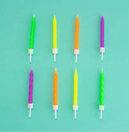 birthday candles on mint backgroundの写真素材