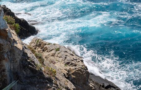 Beautiful Image Of Ocean Waves Rolling And Breaking On Sharp Cliffs And Rocks