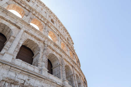 Colosseum at blue sky in Rome, Italy, Europe.