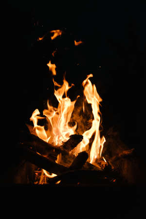 Fire in the fireplace, note shallow depth of field.close up image of fireplace and wood burningの写真素材
