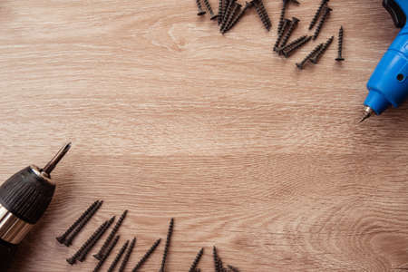 Construction tooling on wooden background ,copy space, maintenance concept.の写真素材