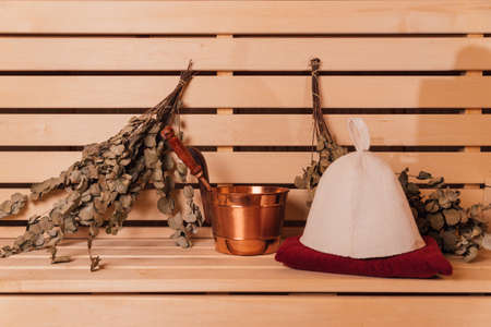 various sauna accessories in a wooden sauna. Sauna spa conceptの写真素材