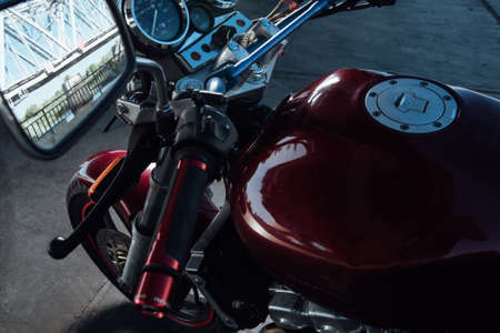 Side view of a red motorcycle.Outdoors red motorcycleの写真素材