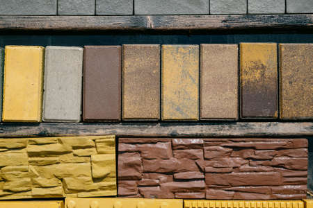 Paving slabs of different colors and shapes.Texture of different colored patterned paving slabs ....