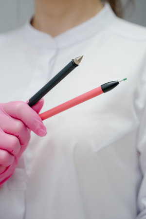 Electroepilation needle close-up. Hardware permanent of unwanted hair removal in the salon.