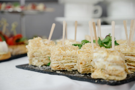 Delicacies and snacks at the buffet or banquet. Catering. snacks on the table at the holiday. banquet snacks. canapes. cateringの写真素材