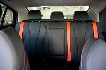 Interior of a modern car with black leather seats. Inside the car. Interior of a prestigious modern car. Comfortable black leather seatsの写真素材