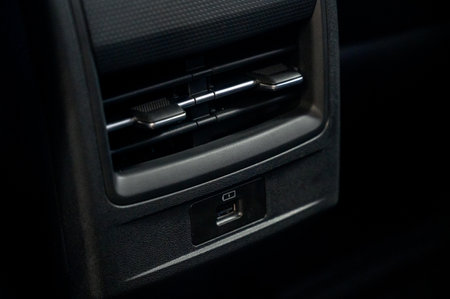 Car air conditioner close-up. Air conditioner flow inside the car. Detailed car interior. Air ductsの写真素材