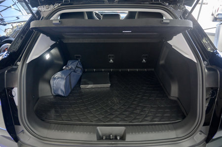 Large black empty car trunk. Open car trunk close up. Empty open trunk of a new modern carの写真素材