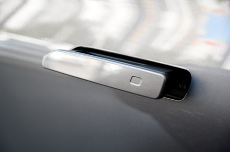 Modern door handle new car. Smart retractable door handles. Car exterior details. Close Up car door...