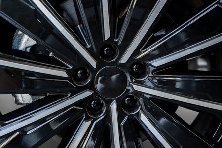 Car wheel with brake calipers and stylish design. Cast disk close up with calipers and brake padsの写真素材