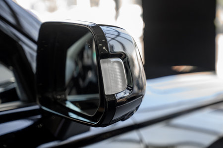 A car side mirror in a close up. Modern Luxury black Car Side Mirrorの写真素材