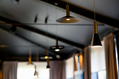 Restaurant or cafe interior with pendant lights. Restaurant, cafe or public space interior concept.