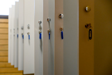 Close-up of open lockers in dressing room
