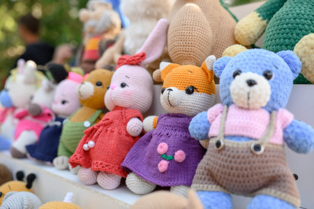 collection of crochet plush toys. handmade soft toys. Multicolored knitted toys made by hand