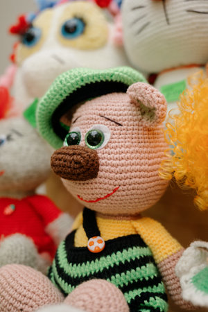 collection of crochet plush toys. handmade soft toys. Multicolored knitted toys made by hand