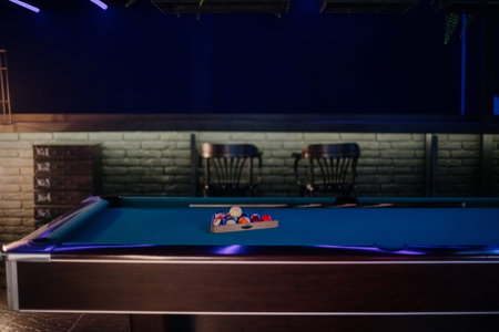 Billiard table with billiard balls close up.Billiard balls in a green pool tableの写真素材