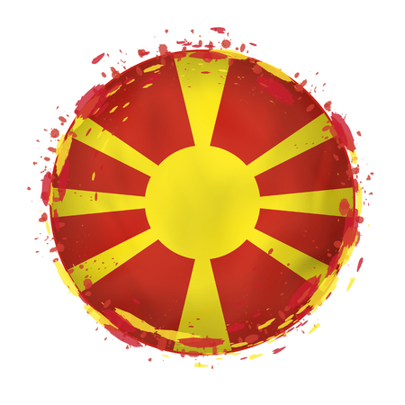 Round grunge flag of Macedonia with splashes in flag color. Vector illustration.のイラスト素材