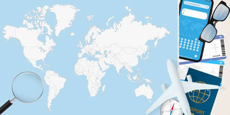 Vector illustration of vacation preparation with world map and tourist equipment. Vector illustration in flat design.のイラスト素材