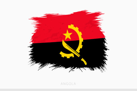 Grunge flag of Angola, vector abstract grunge brushed flag of Angola on gray background.のイラスト素材