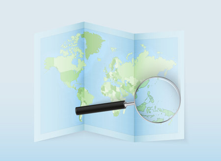 A folded world map with a magnifying lens pointing towards Palau. Map and flag of Italy in loupe. Vector illustration in blue color tone.のイラスト素材