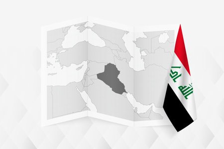 A grayscale map of Iraq with a hanging Iraqi flag on one side. Vector map for many types of news. Vector illustration.のイラスト素材