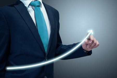 Businessman in suit drawing business growth data chart with diagram, report on company investment progress, quarterly report Q1/Q2/Q3/Q4, first/second/third/fourth quarterの写真素材