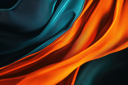 Abstract close-up of draped fabric in teal and orange hues, showcasing its smooth, flowing texture.の素材