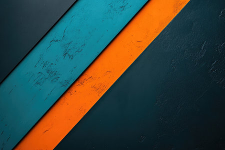 A close-up abstract image with a diagonal pattern of blue, orange, and black stripes on a textured surface.の素材