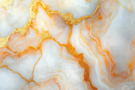 A close-up shot of a white marble surface with intricate golden veins and patterns.の素材